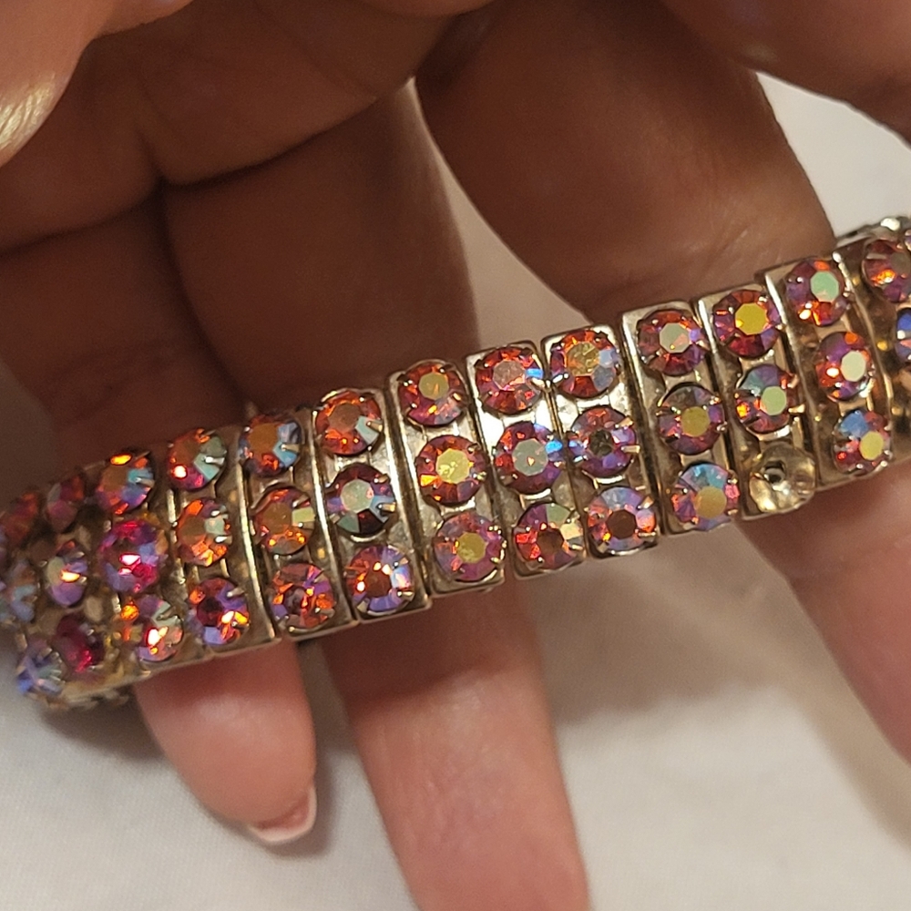 beautiful vintage aurora borealis red pink tones bracelet, missing few gems